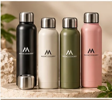 Slim vacuum insulated bottles with stainless steel caps in black, cream, green and pink